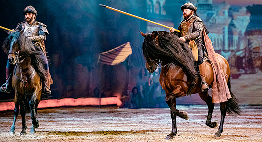 Riders on stage with the garrocha 